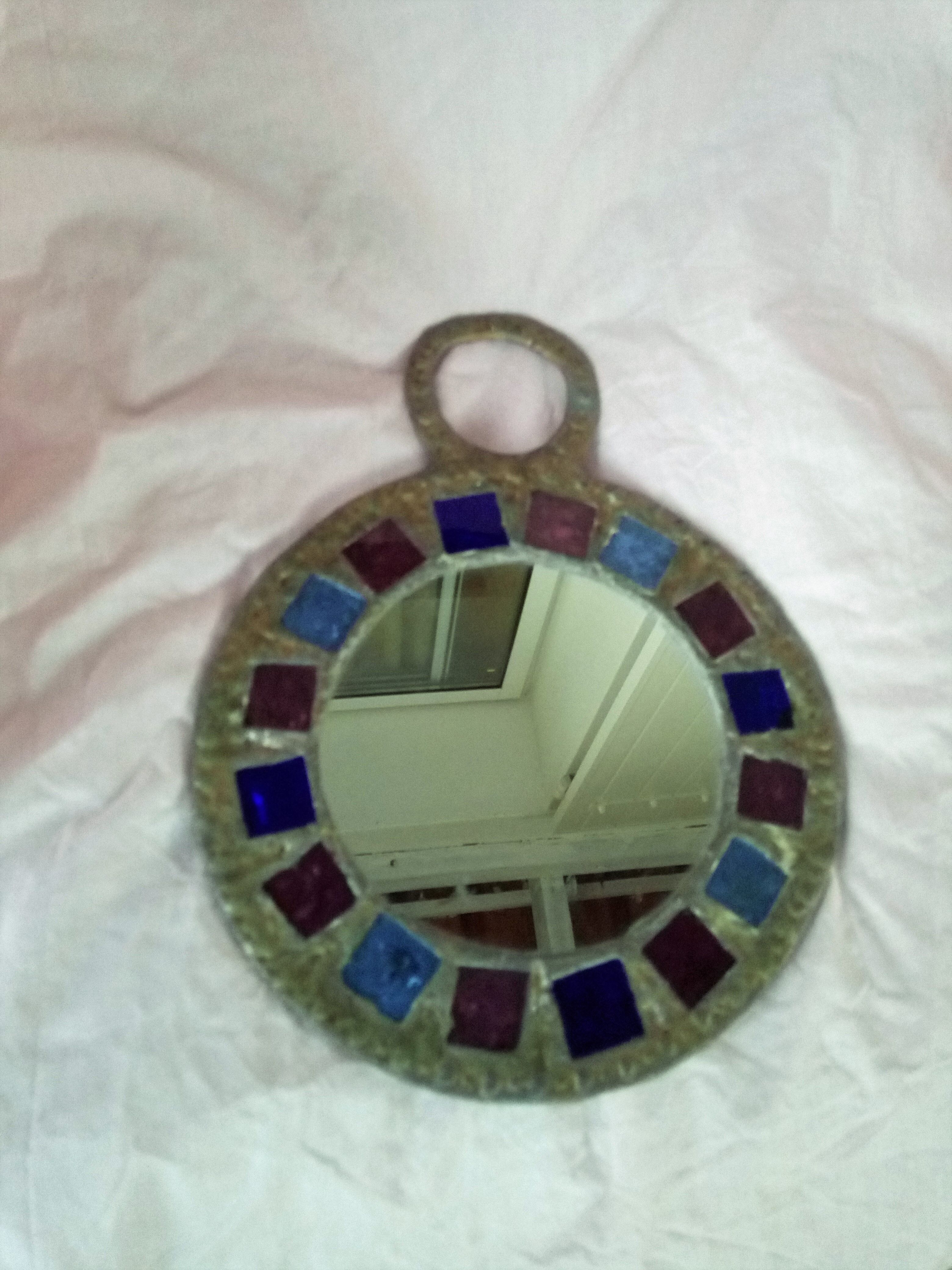 Lead and glass hand mirror