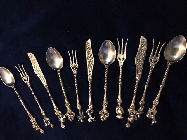 Set 11 of old cutlery with silver metal desert