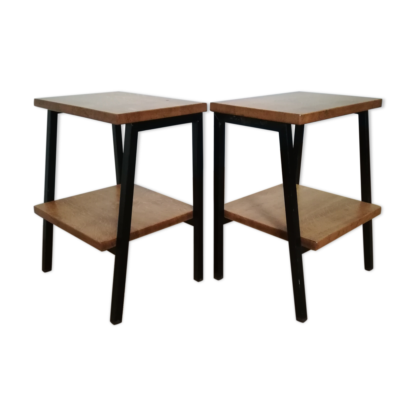 A pair of bedside tables