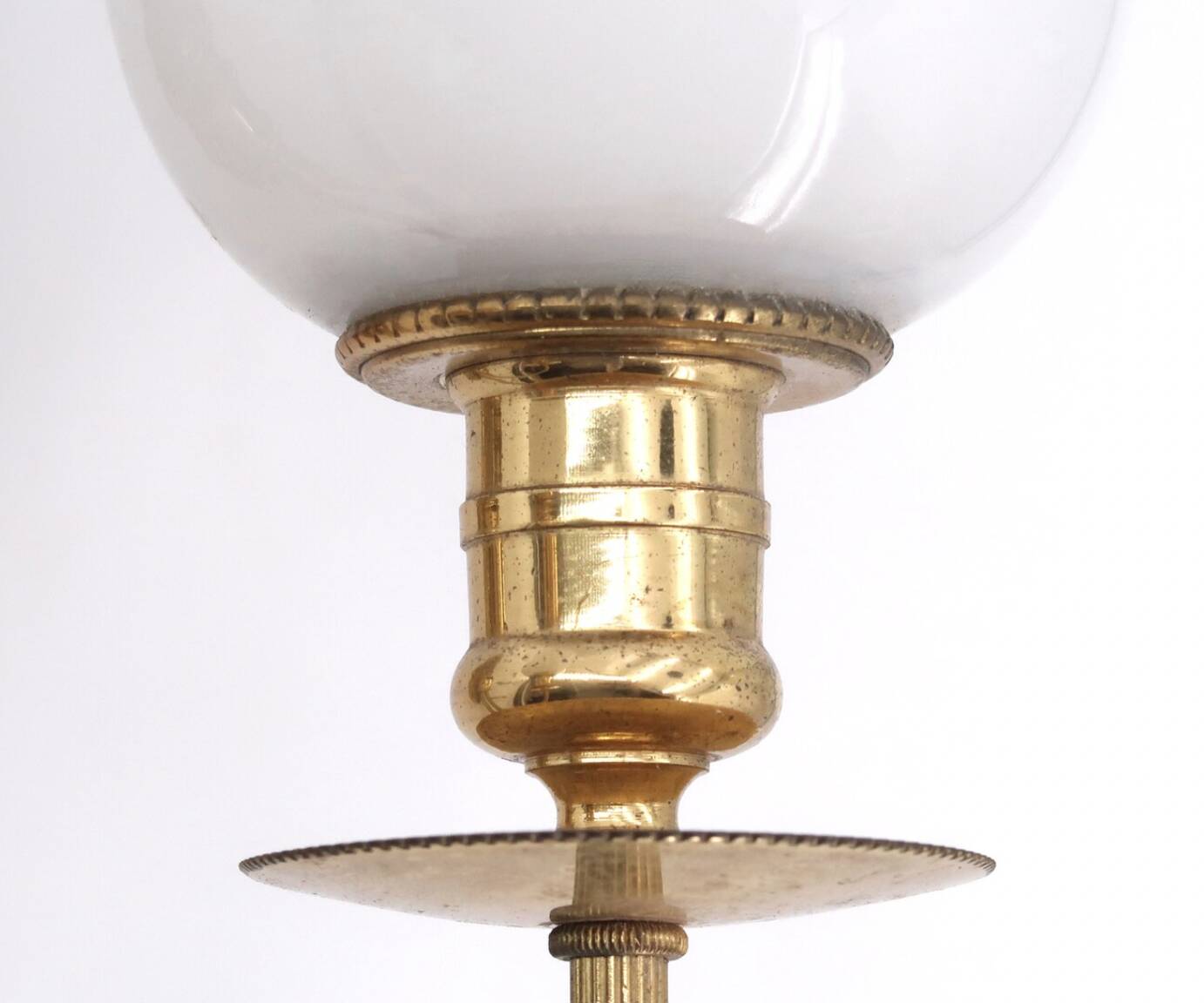 Pair of brass and opaque glass wall lights, 1950s