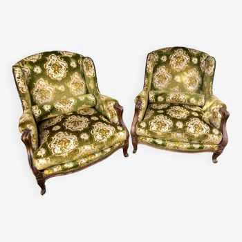 Pair of large antique wingback armchairs