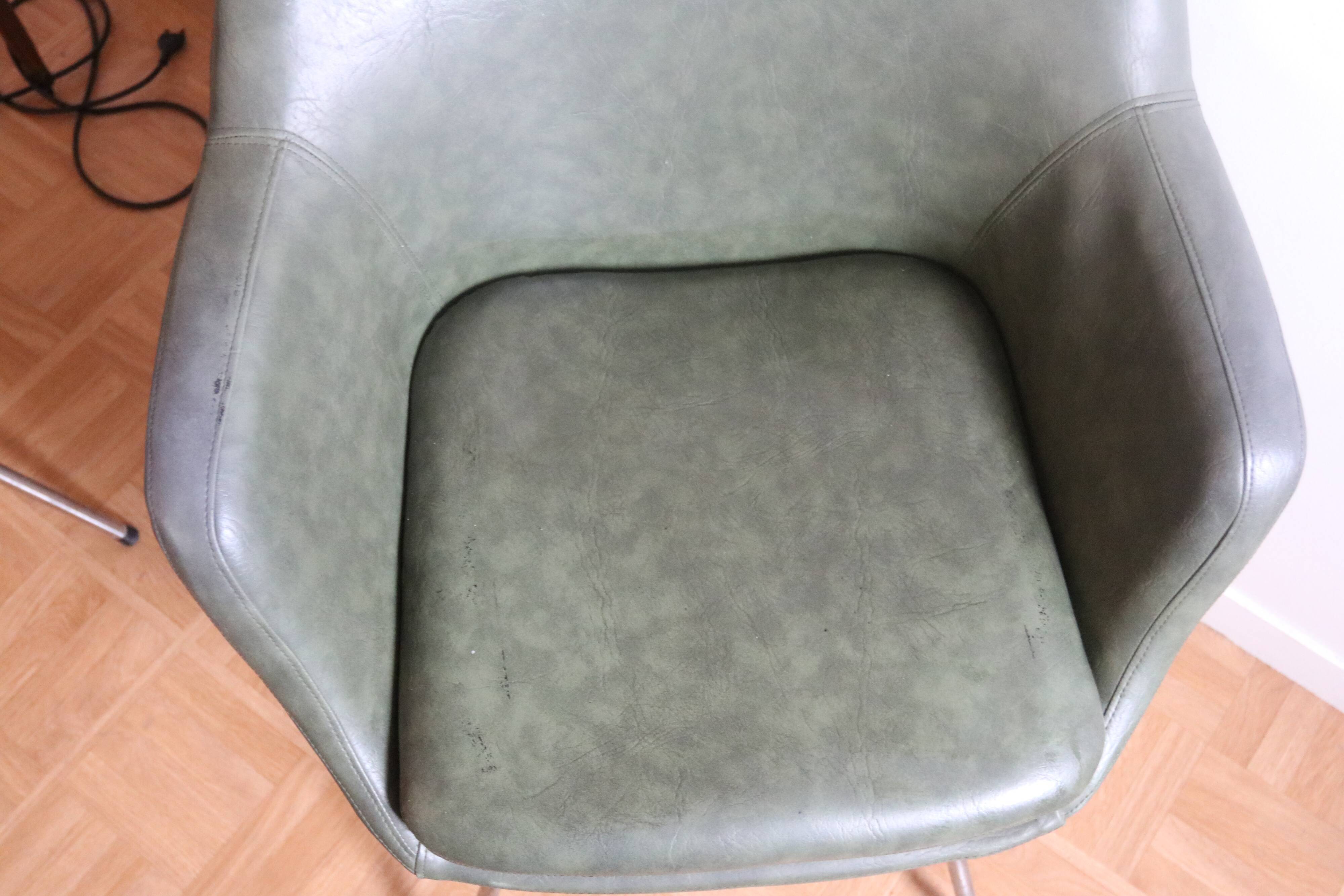 Three green skai chairs with chrome feet