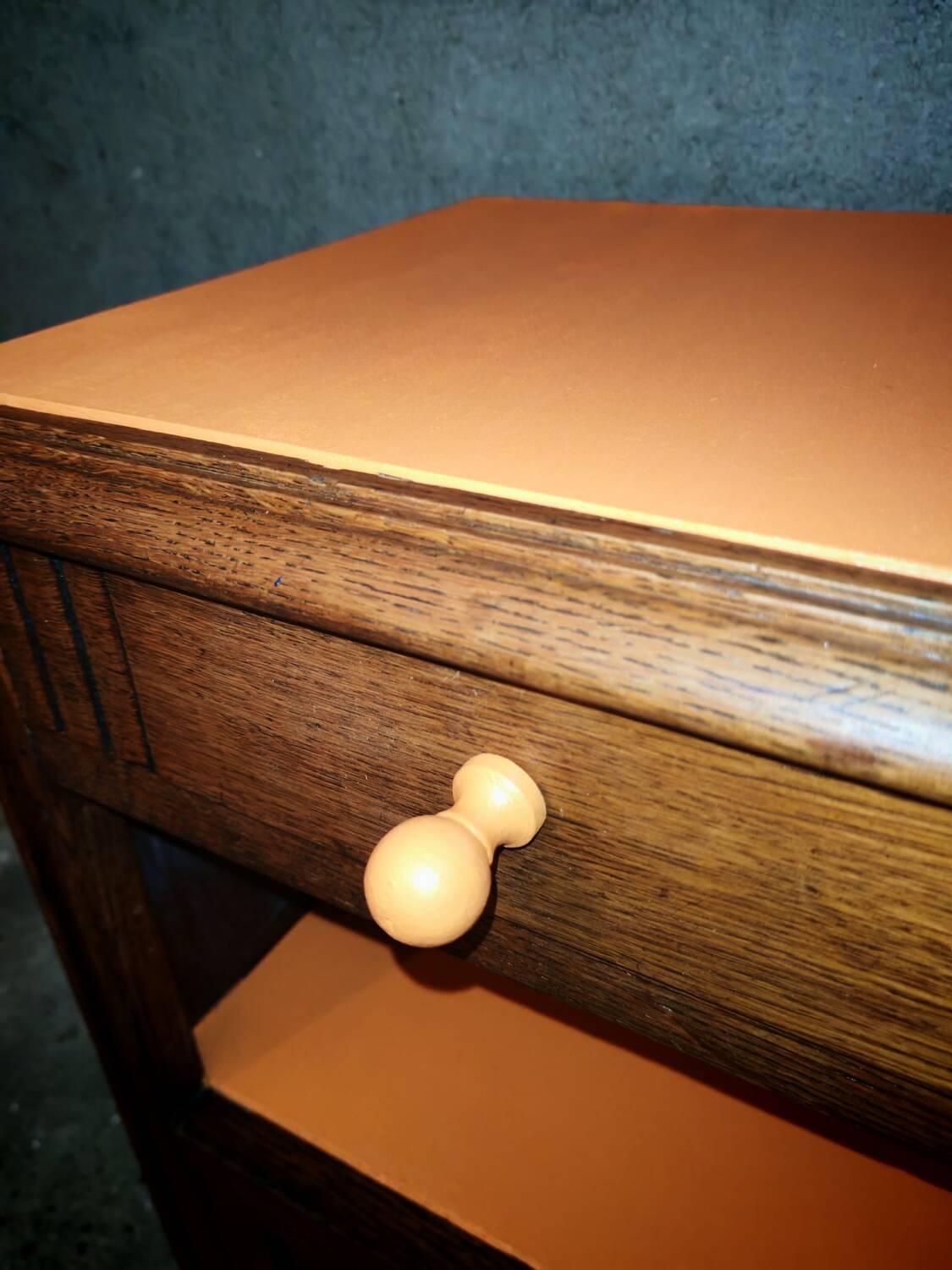 Art Deco orange bedside table