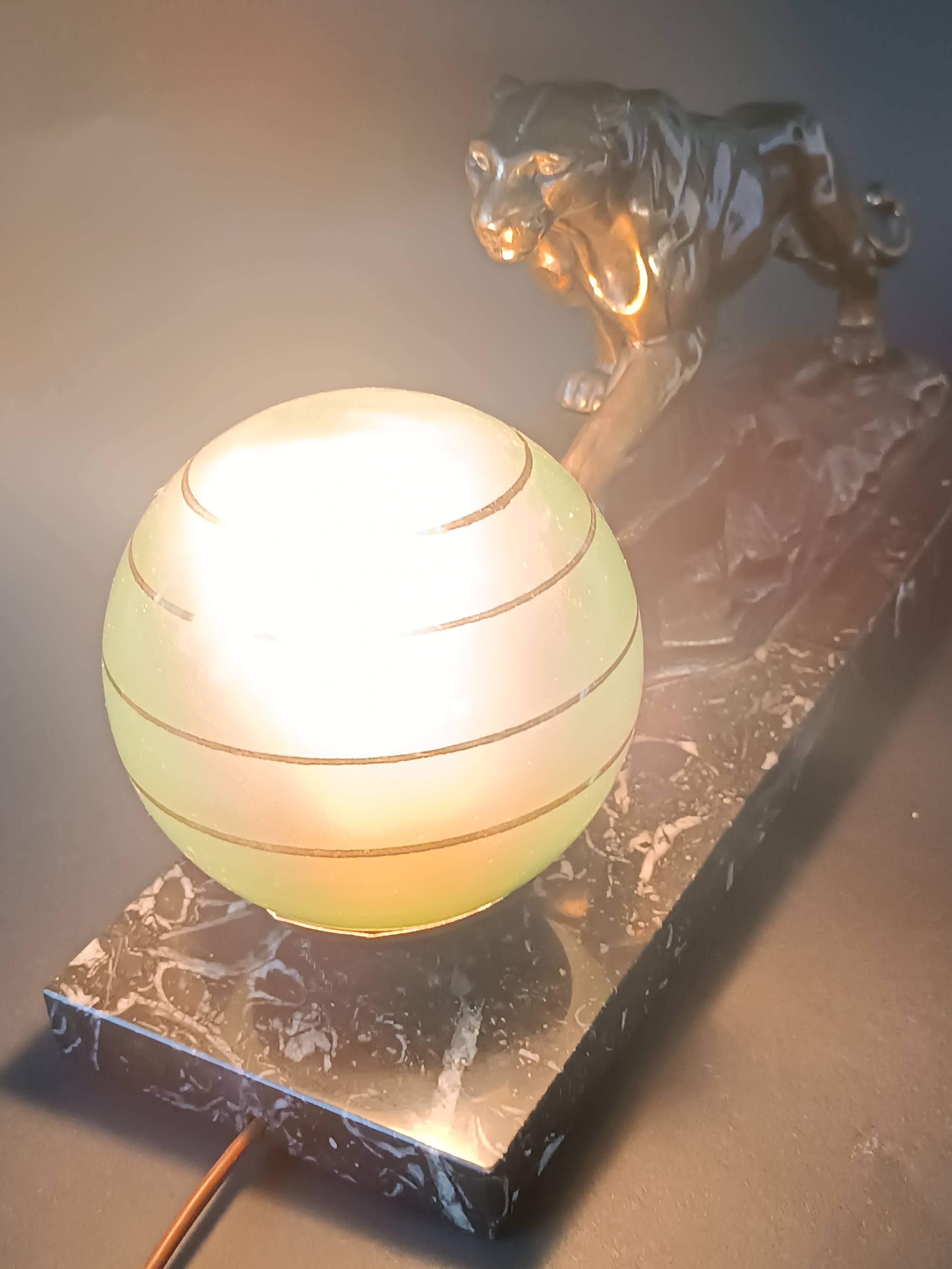 Panther desk lamp in spelter on a black and white marble base 1925
