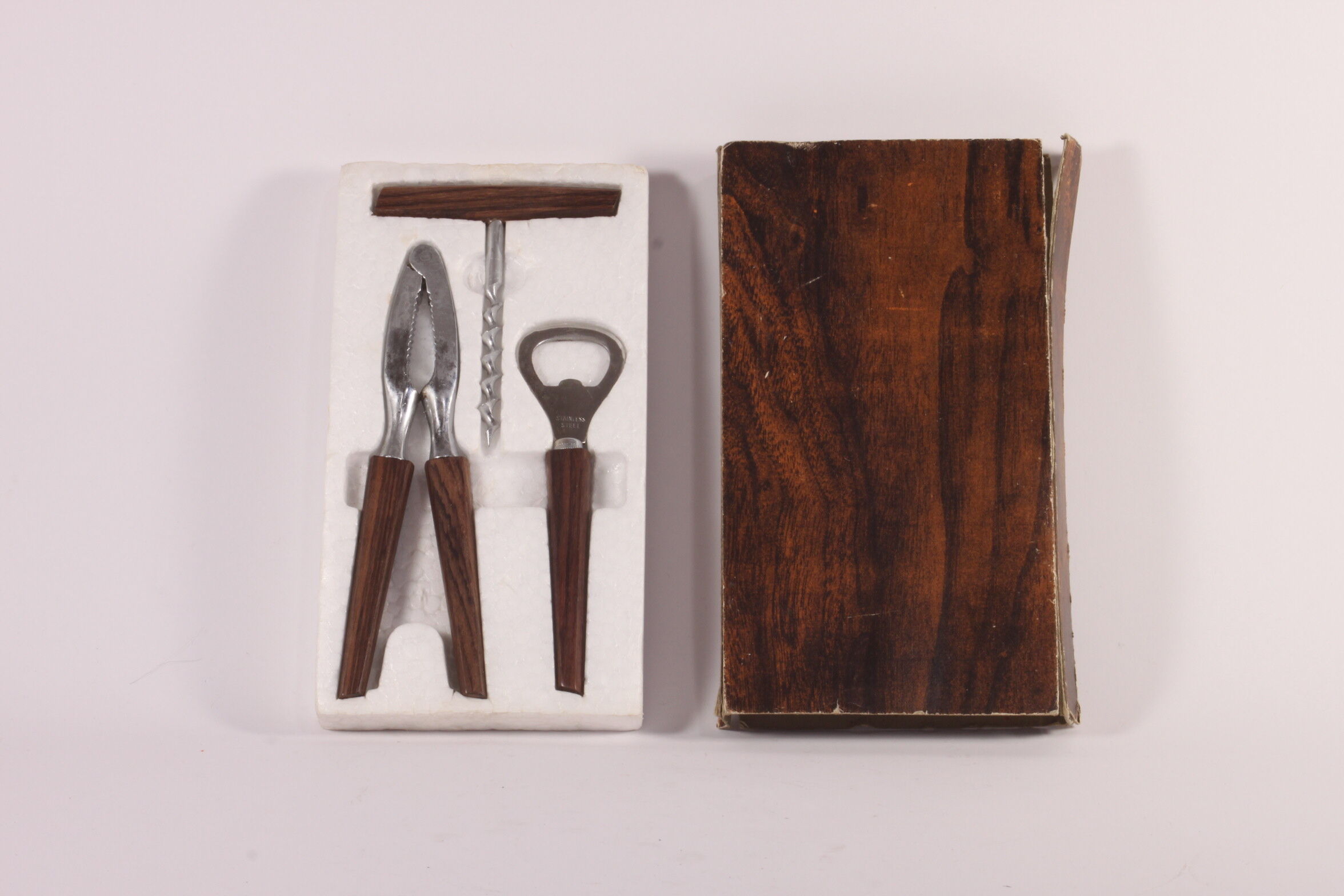 Teak wooden bottle opener, corkscrew and nutcracker set