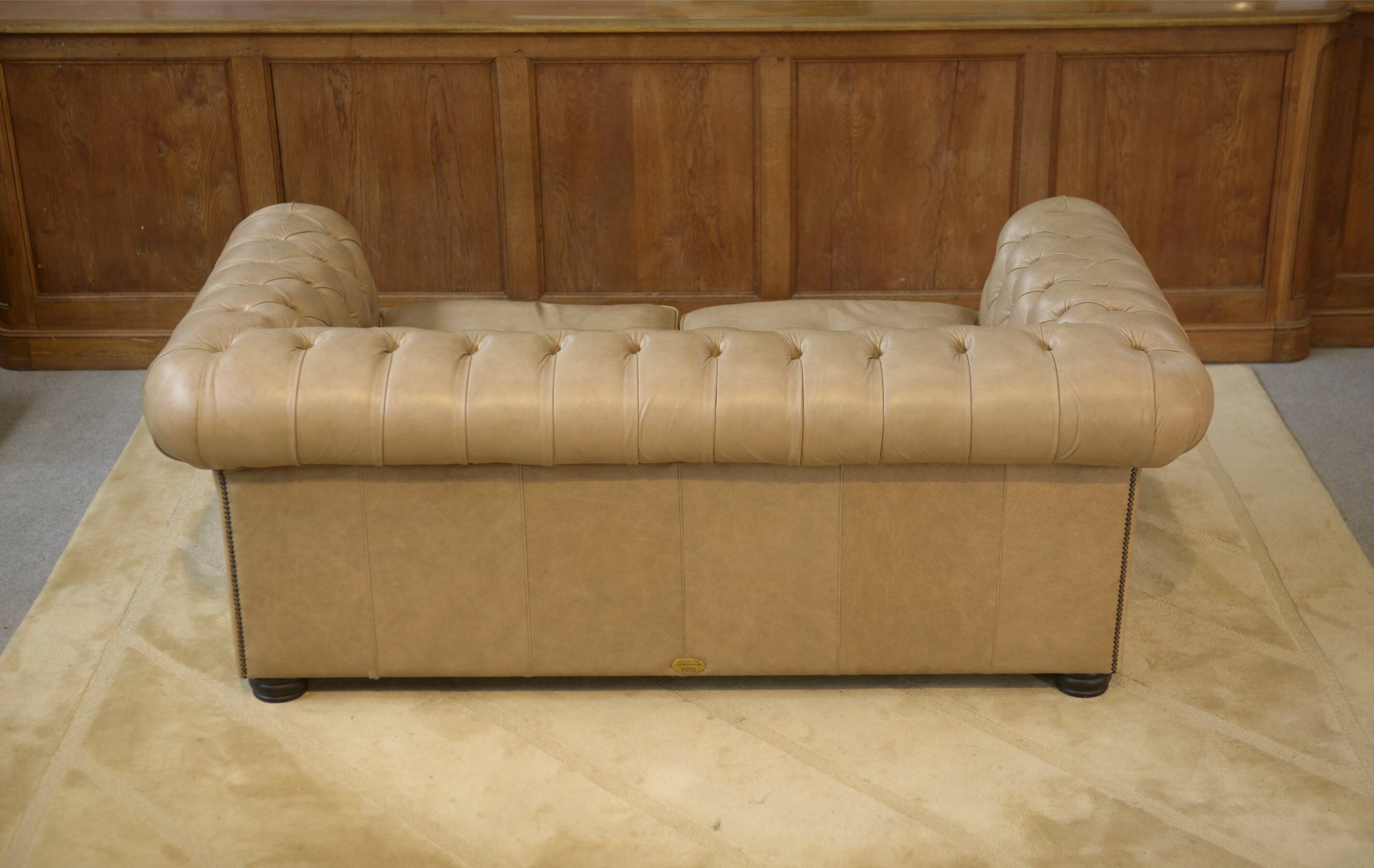 Beige leather Chesterfield sofa handmade in England.