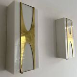 Pair of Loewy wall lights for Hilton, brass and Perspex, France 1965