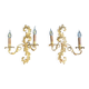 Pair of Italian Hollywood Regency wall lights in iron and gilded sheet metal.