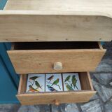 Asymmetrical changing table cabinet