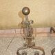 Andirons cast iron and brass ball