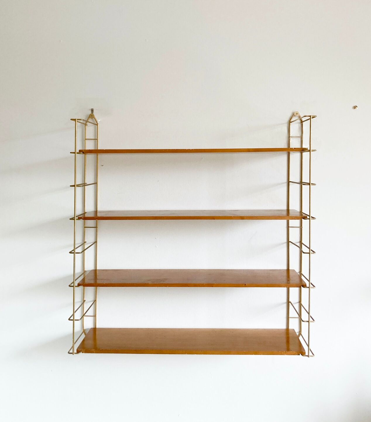 Vintage Tomado wall shelf