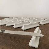 Vintage knife holders of 12, in white wave-shaped porcelain