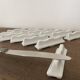 Vintage knife holders of 12, in white wave-shaped porcelain