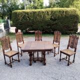 Solid wood beech table with 5 wooden chairs and canning.