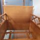 Vintage baby cot with splayed legs.