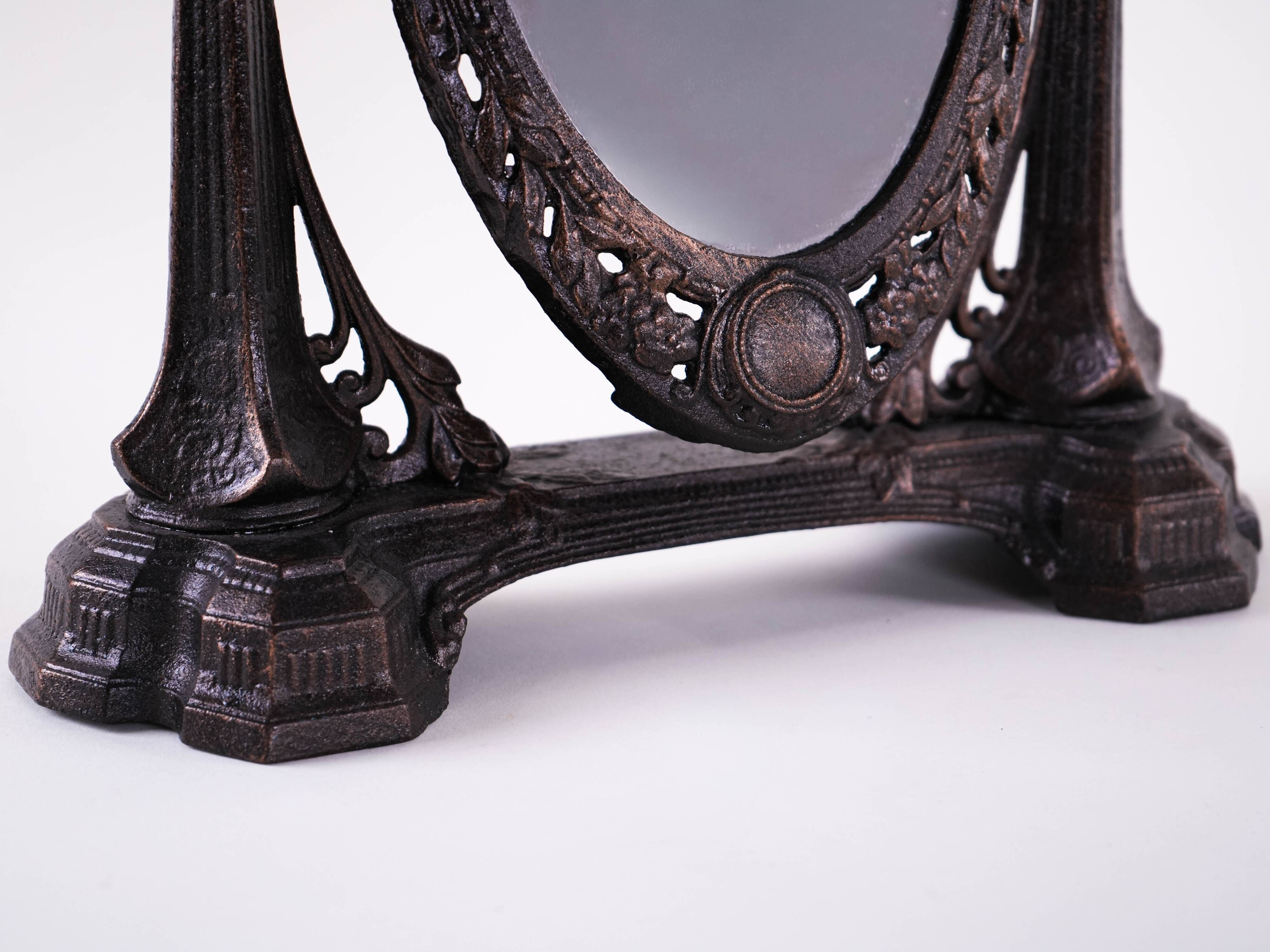 Art Nouveau table mirror with ornamental metal frame, early 20th century