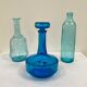 Vintage turquoise blue glass vase/decanter