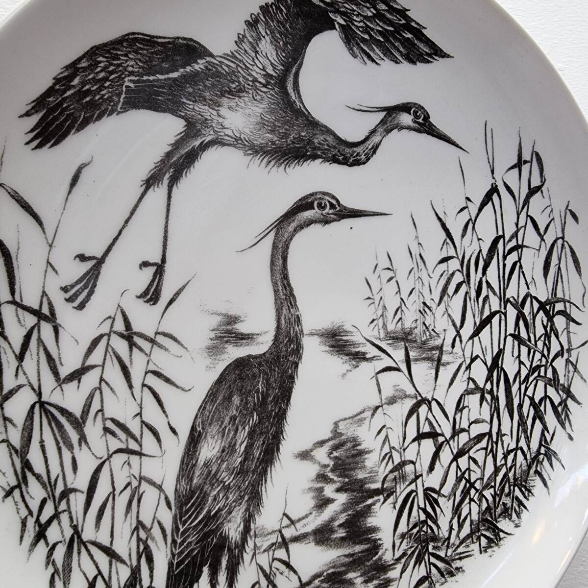 Vintage wall plate with herons