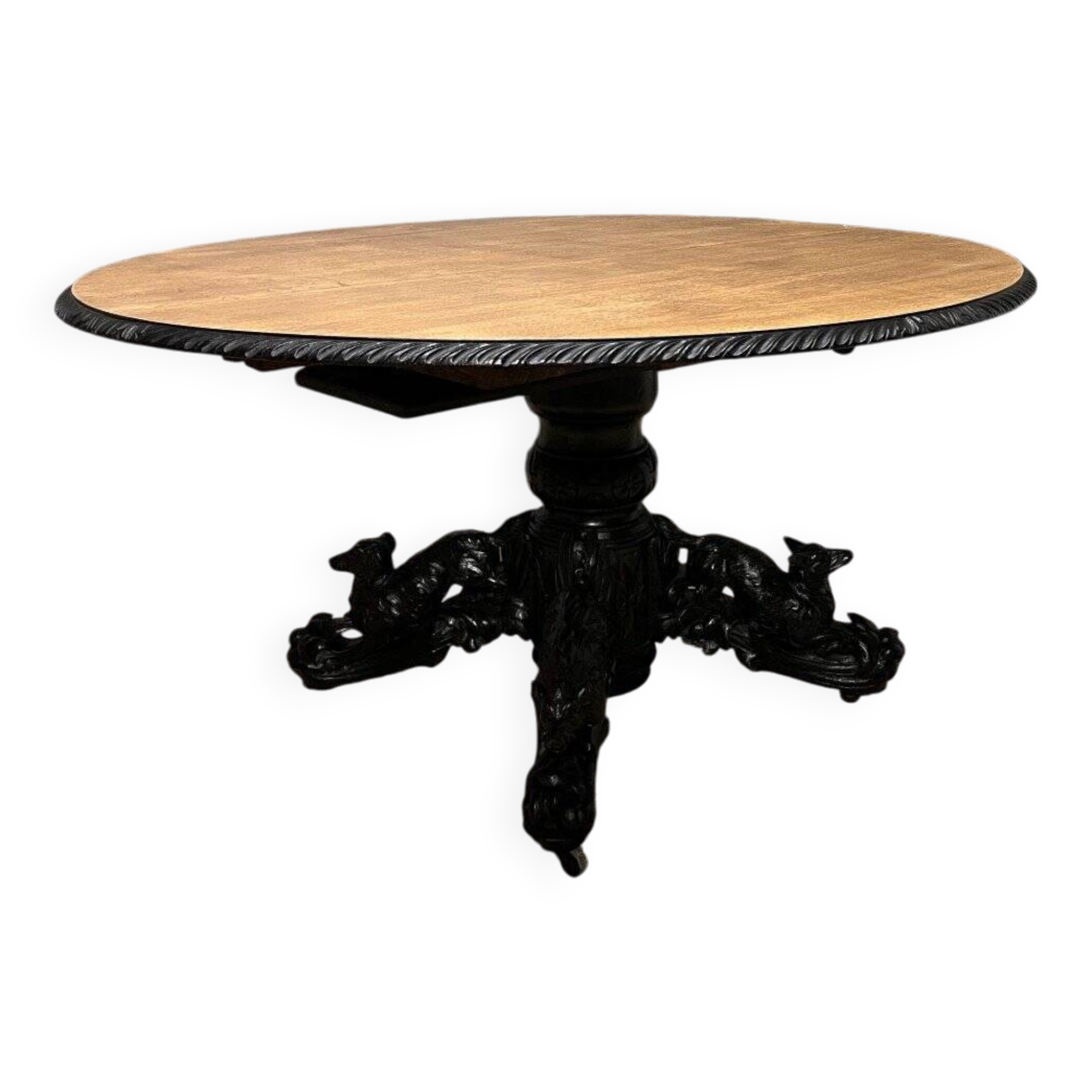 Large oval oak hunting table with central leg and extensions