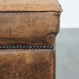 Sturdy square vintage sheepskin pouf/ottoman with beautiful colours