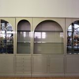 Showcases in lacquered wood, glass and brass  1970s, set of 4