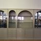 Showcases in lacquered wood, glass and brass  1970s, set of 4