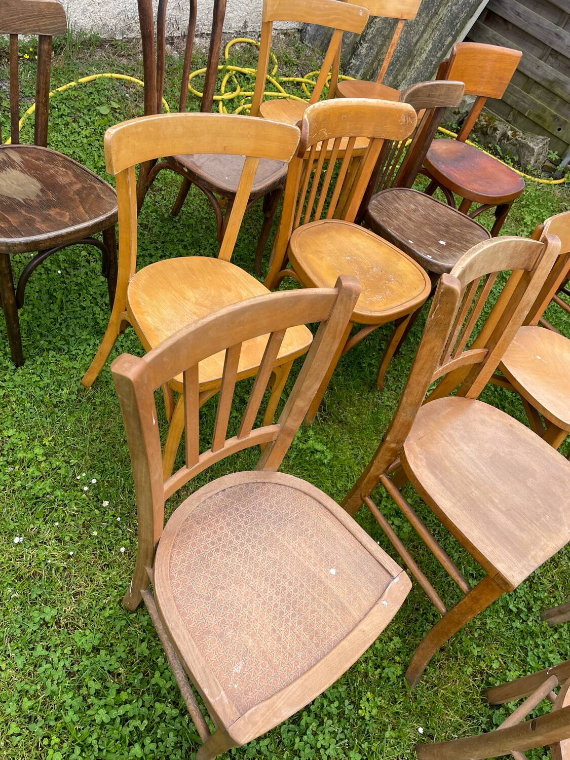 Lot of 16 mismatched bistro chairs