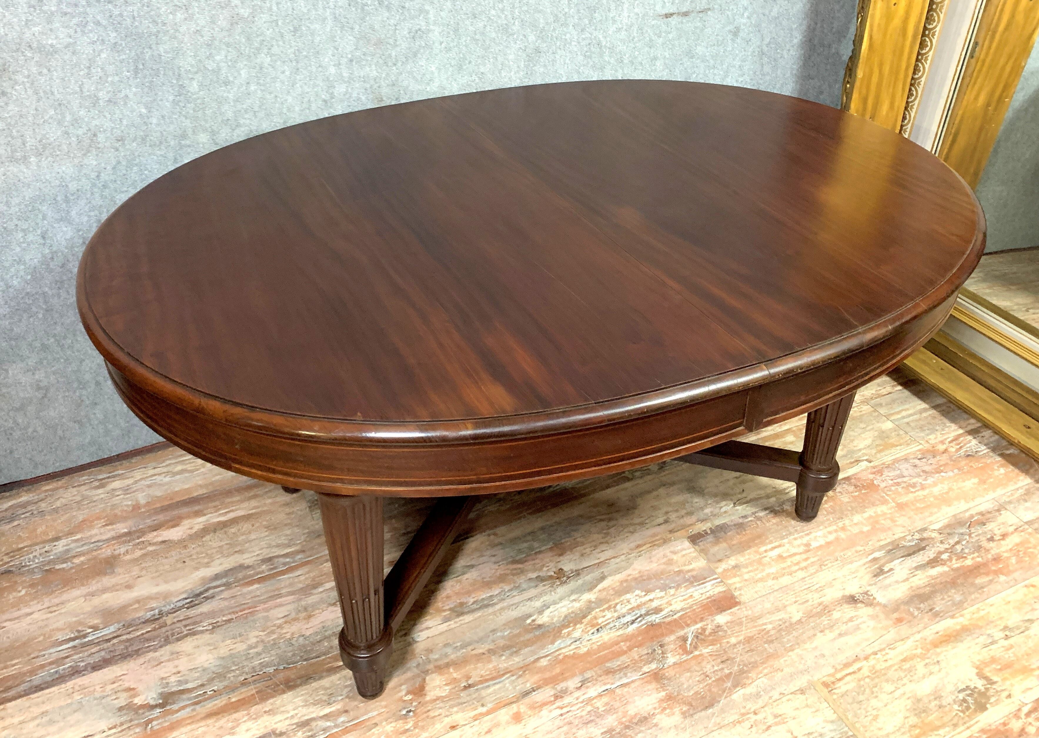 Eugène Printz: Large Louis XVI mahogany elongation table circa 1880