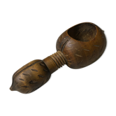 Old wooden nutcracker and hazelnut