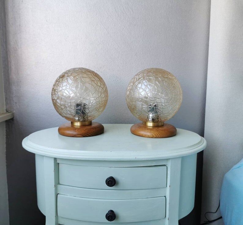 Wooden table lights with 70s gold glass hood