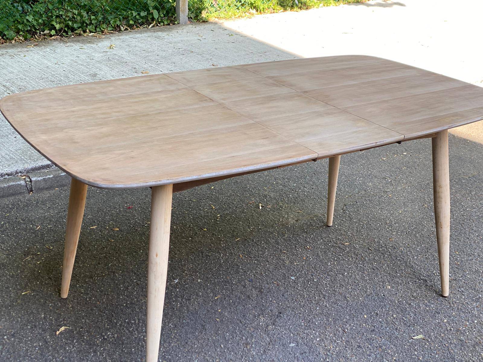 Renovated Scandinavian extendable dining table in teak and veneer from 1980.