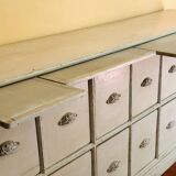 Solid wood sideboard with drawers.
