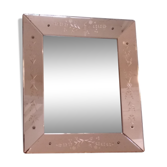 Venetian mirror with pink edge and engraved decorations