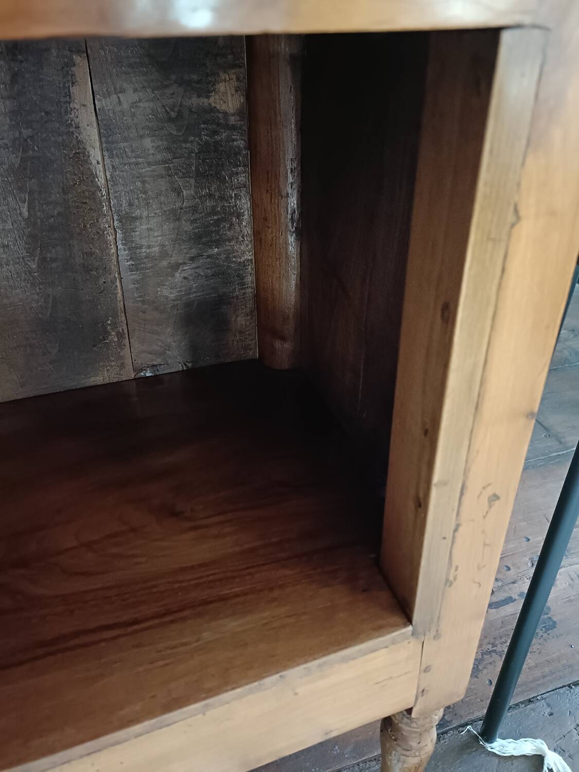 Open wooden bedside table