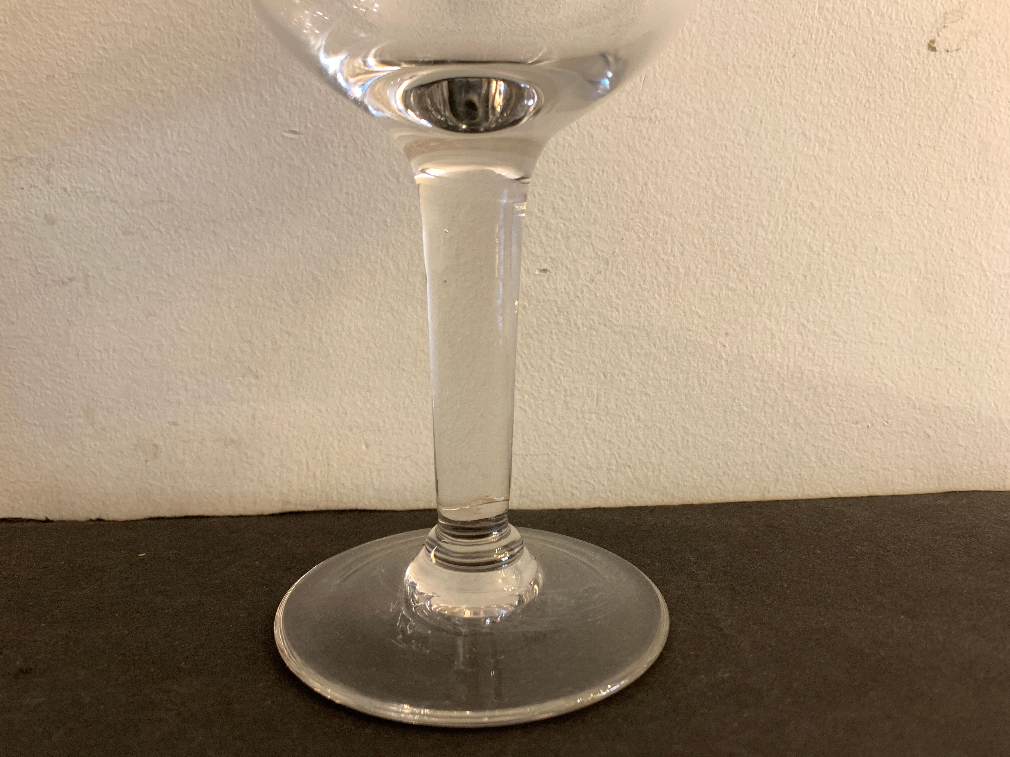 10 blown and engraved stemmed glasses