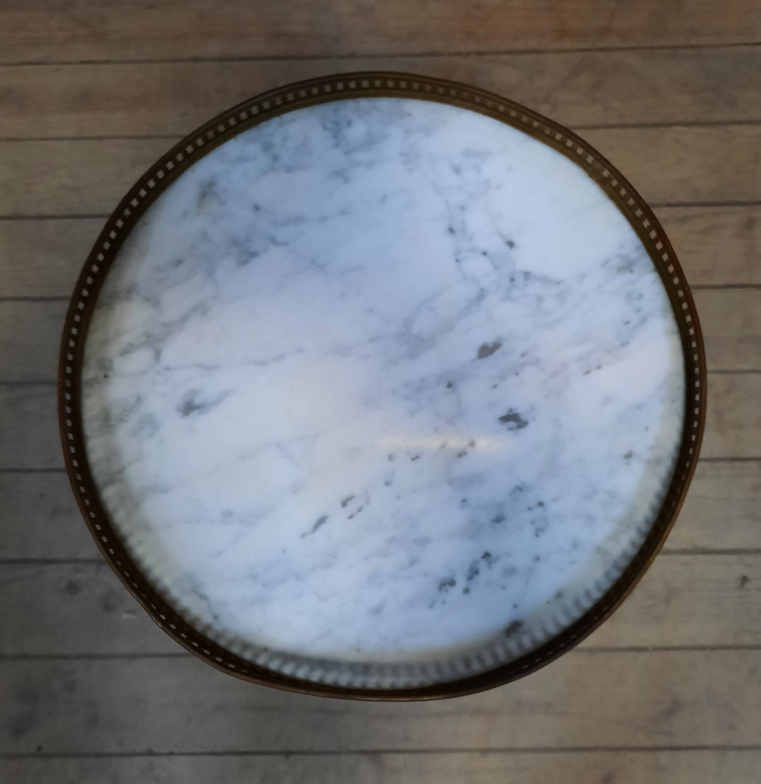 Small marble top pedestal table