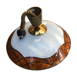 Suspension in the shape of a disc on a seventies style roller