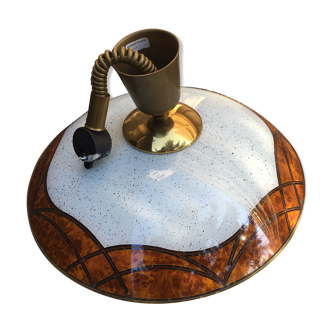 Suspension in the shape of a disc on a seventies style roller