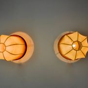 Pair of "cocoon" wall lights, resin and pine, Italy, 1970