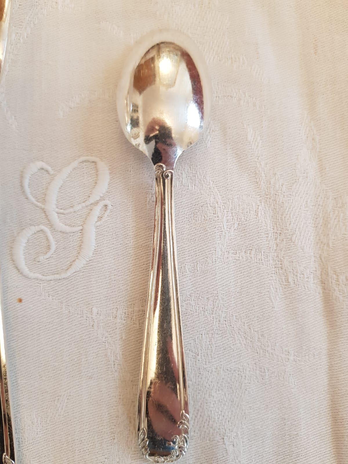 Silver cutlery set with 36 place settings and ladle