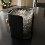 6 individual ashtrays in a leather case