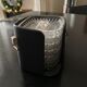 6 individual ashtrays in a leather case