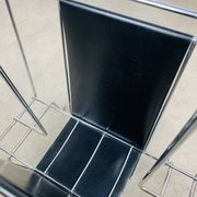 Chrome and black leather magazine rack, 1970s.