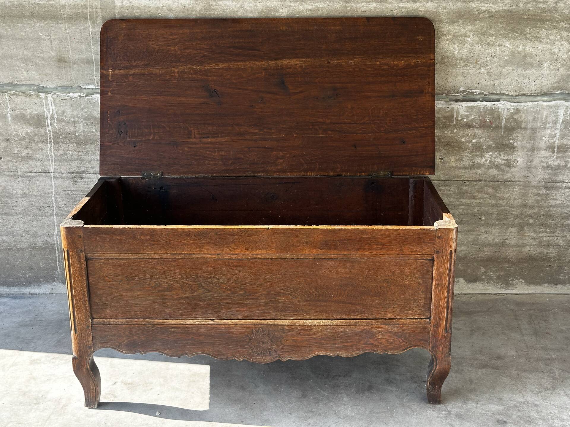 French provincial chest in carved and pegged solid oak, 18th century.