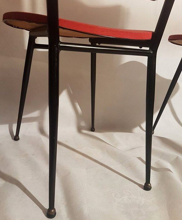 Série de 4 chaises 1950 skaï rouge pieds métal compas