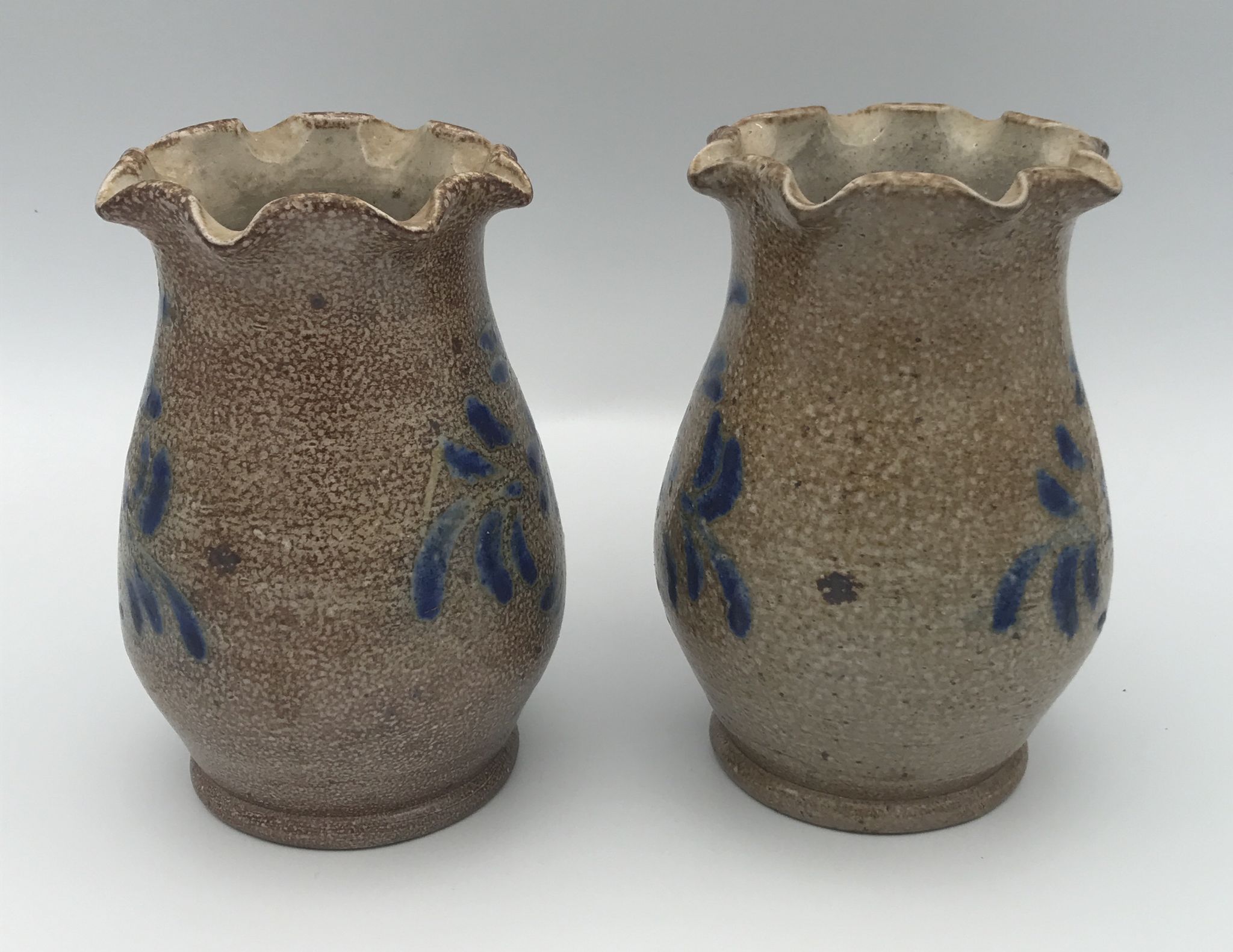 Pair of vintage pottery vases with floral decoration and glaçureau sel