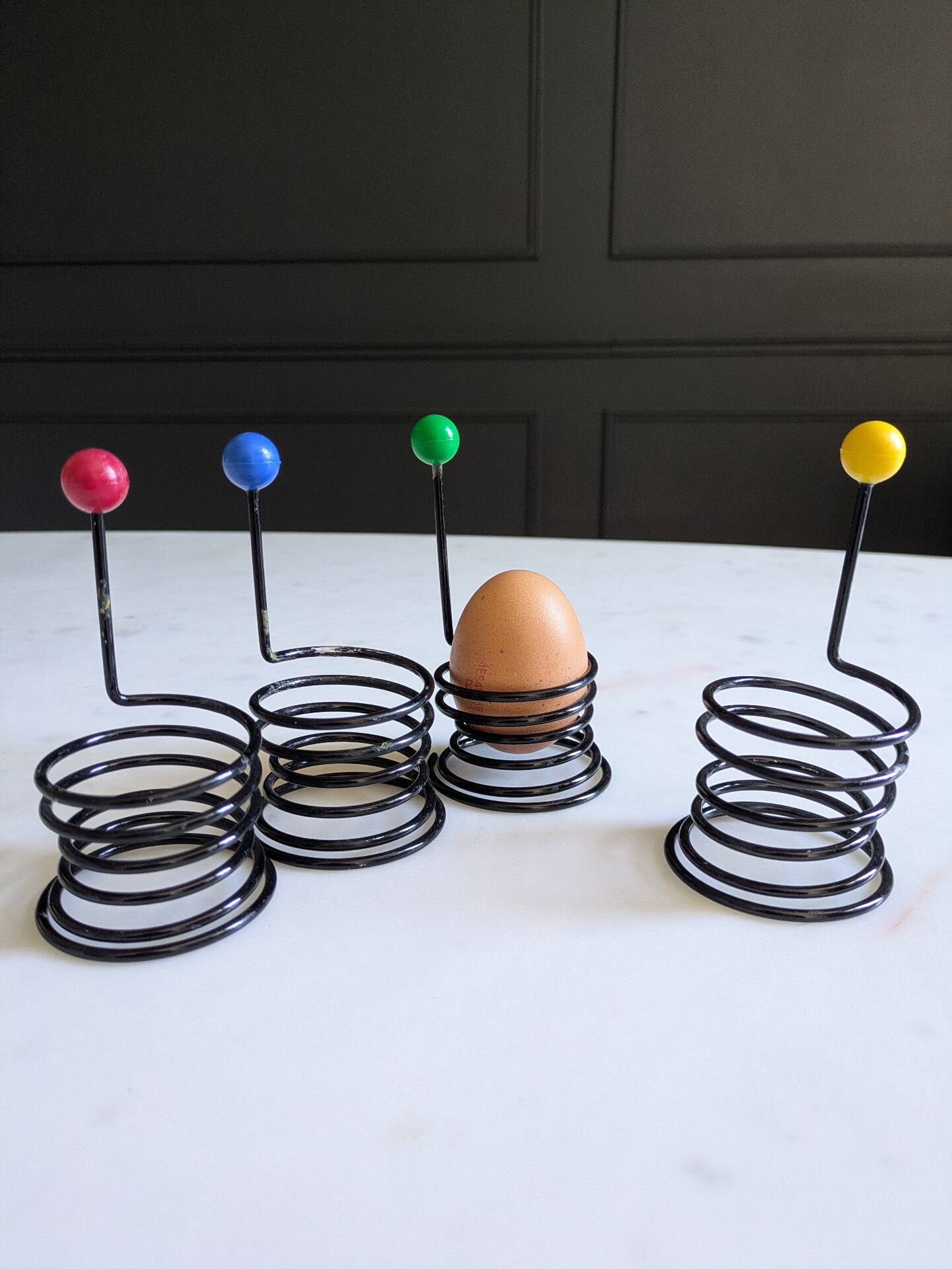 Set of egg cups "Egg Boy" by Wang and Merlo. Memphis design 80s.