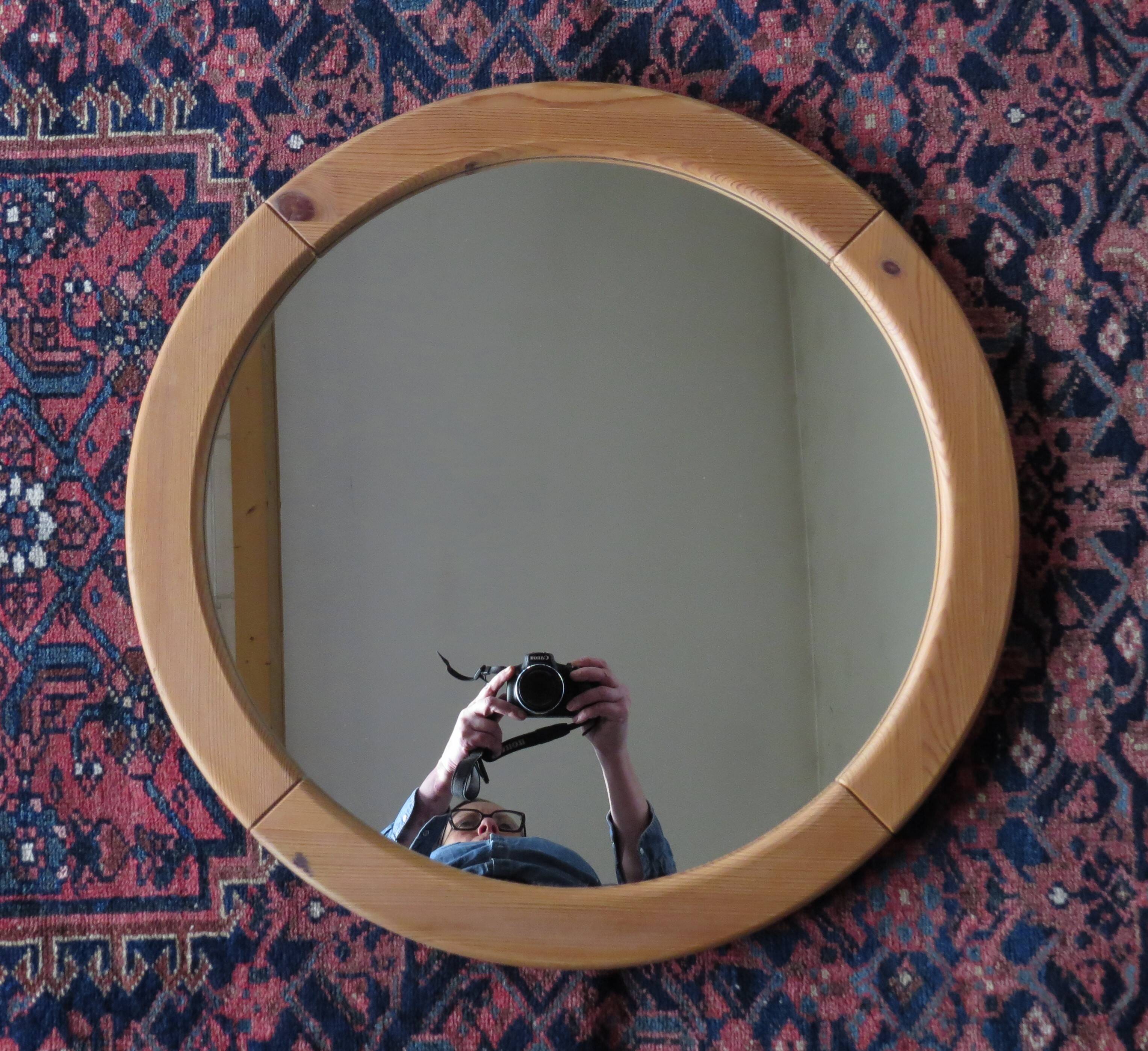 Pair of round Scandinavian pine mirrors from the 70s