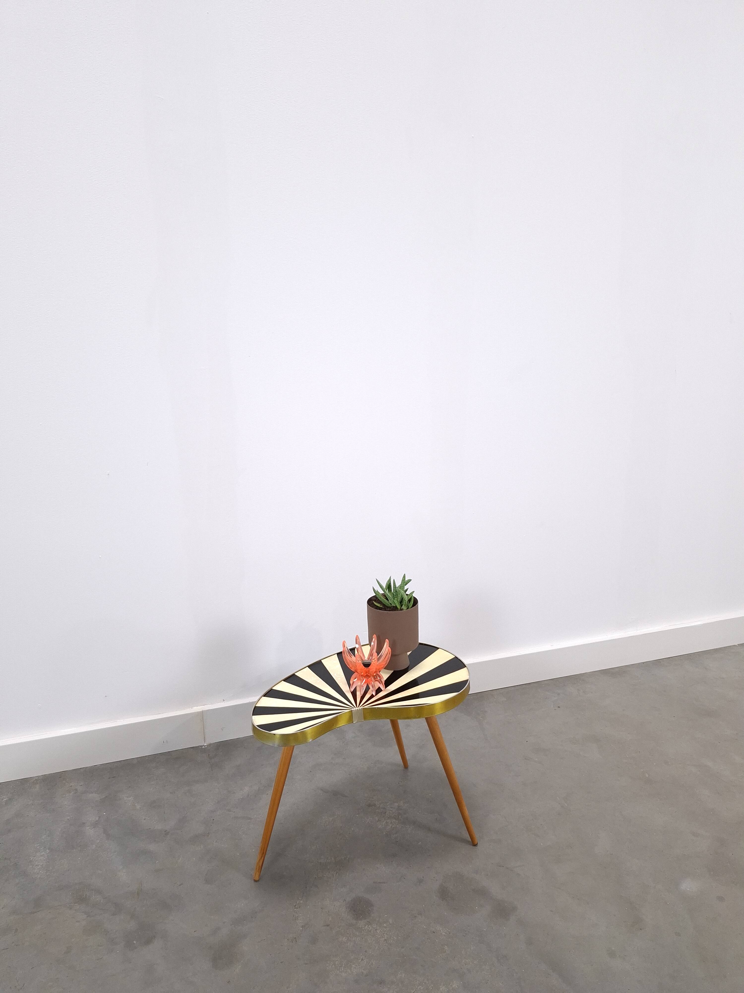 1950s kidney-shaped black and white table, plant table.