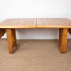 Large extendable dining table in solid oak by Guillerme and Chambron.